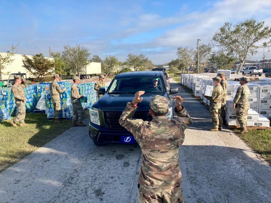 Florida National Guard Soldiers from the 1-124th Battalion providing food, water and ice at a point of distribution center on Oct. 1, 2022, in Fort Myers, Fl.