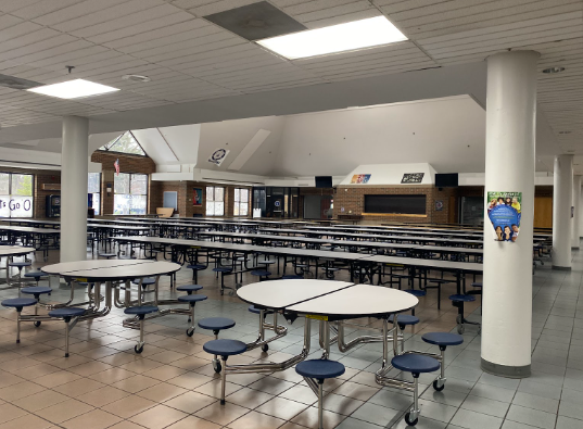 HHS cafeteria where students socialize with the little time they have. If students had more time here benefits in their health and friendships would appear. 