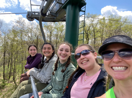 Mrs. Stiffler with four H2BE students on a ski lift during the
H2BE backpacking trip in the Laurel Highlands.