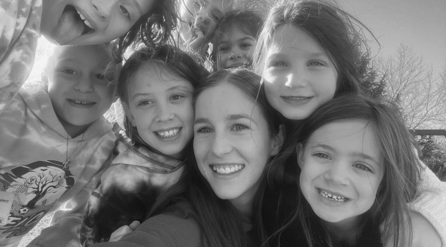 A quick selfie is snapped during outdoor recess with students of Mrs. Oleksiws 2nd grade class.