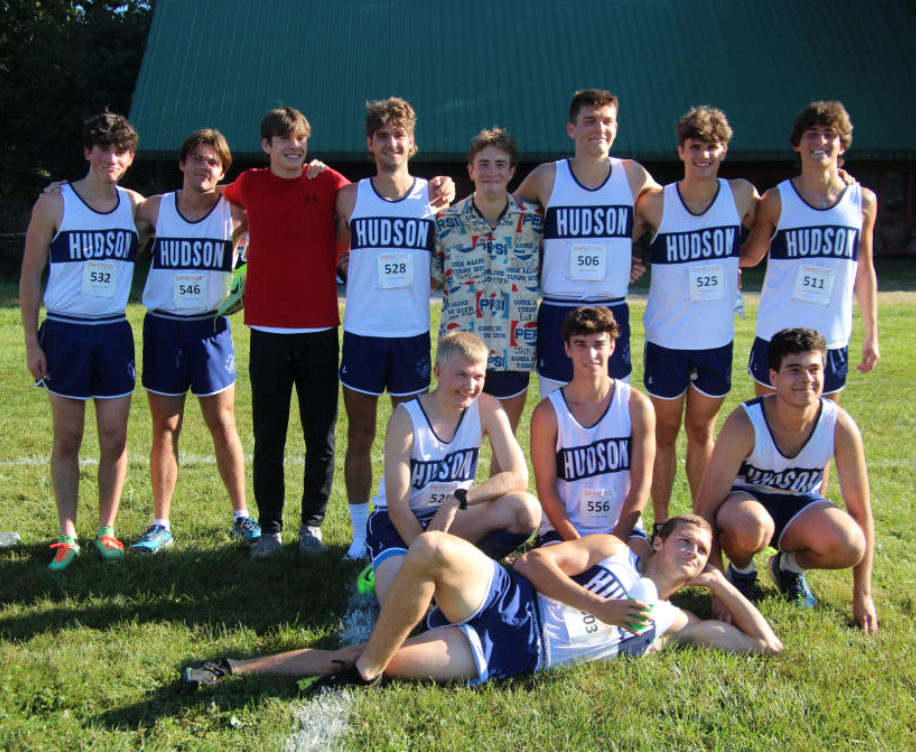 Matthew Banko (laying on the ground) poses with the other Boys Cross Country Seniors