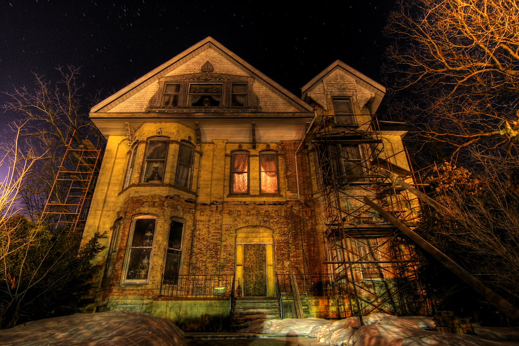 This is a picture of a haunted house. Haunted houses are loved by many, especially during the Halloween season. 