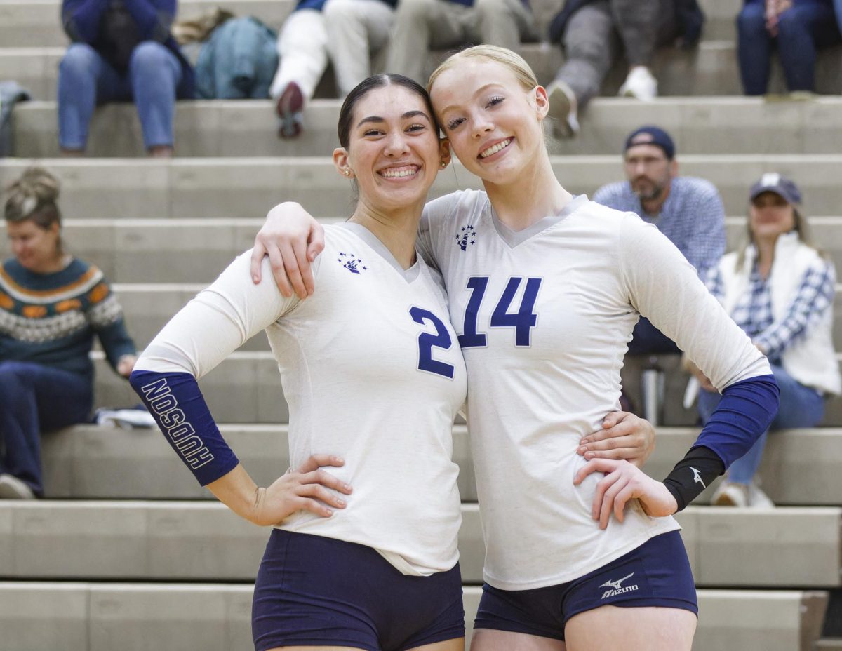 Mirabella Iriarte (#2) and Sydney Waller (#14) posing for a photo during their game against North Royalton. Iriarte will continue her volleyball career at Duquesne University and Waller will continue on at Samford University. 