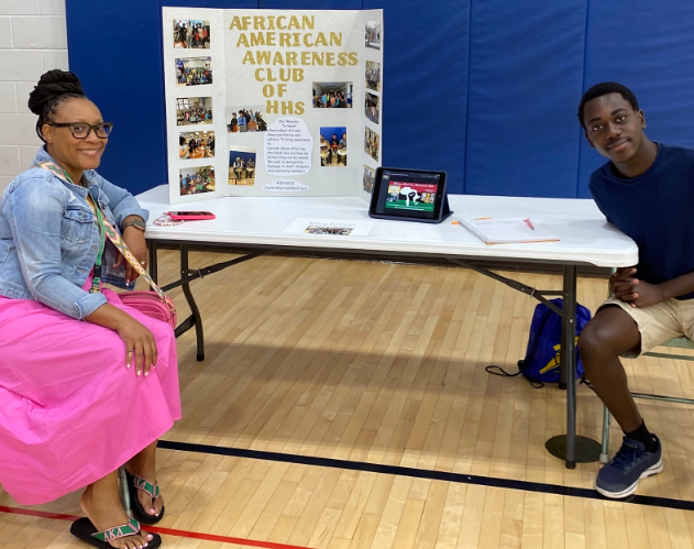 Mrs. Boyd Funderburk and Nathaniel Pierre-Louis at the Freshman Club Fair in August of this year. The club meets every-other Explorer Period in the study hall room.