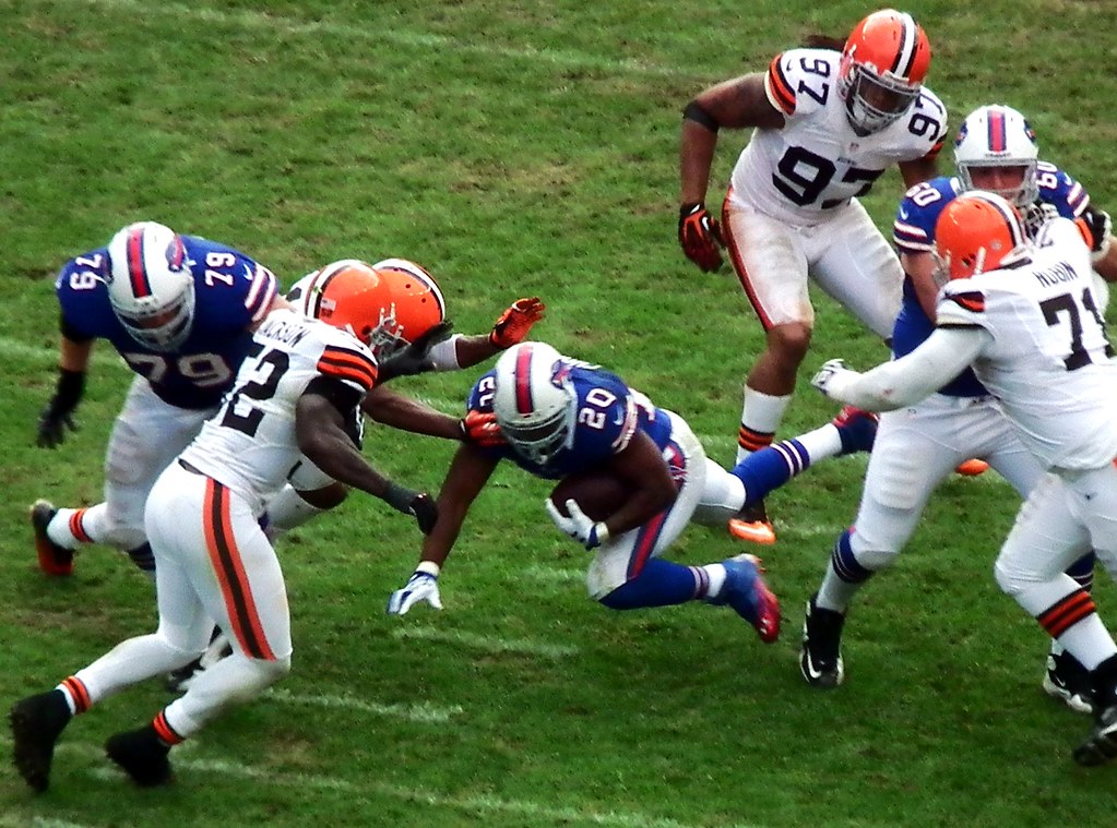 The Browns defense goes head-to-head with players from the Buffalo Bills.  Cleveland Browns Defense by Erik Drost is licensed under CC BY 2.0.