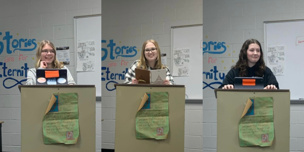 (From left to right) Madison Stepnicka, Ava Tallat-Kelpsa and Camryn Jagodzinski reading their writing aloud. Writing Club gives members a space to develop their writing style and their comfort level with sharing their work.