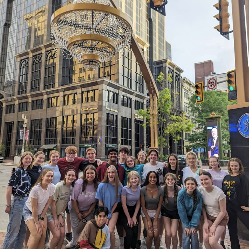 Drama Club members pose in front of the Playhouse Square chandelier before a rehearsal for the Dazzle Awards. Used with permission/Hudson Drama Club Facebook.