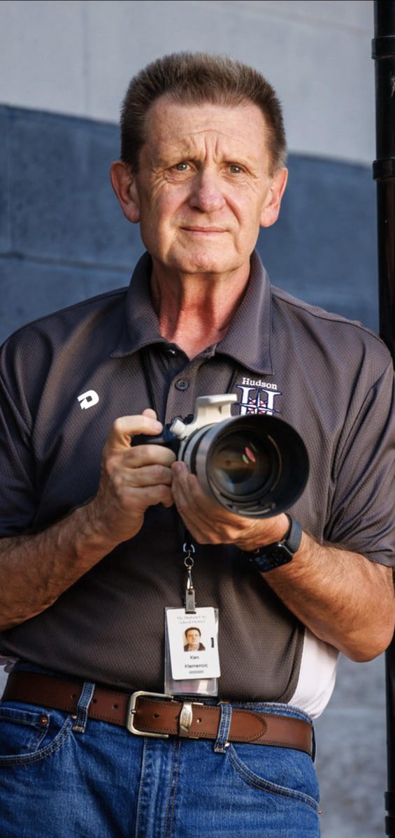 A portrait of Hudson sports photographer Ken Klemencic. Klemencic uses his talent of photography to give back to his community daily. 