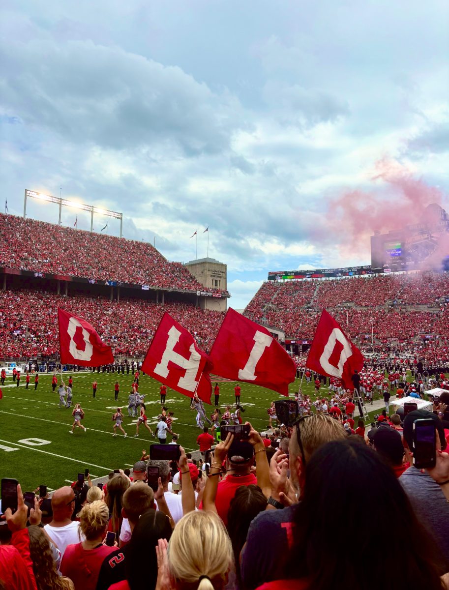 Capturing the opening flag celebration from the prior national champions, Ohio State Buckeyes. This was taking place at the Ohio State Stadium, The Shoe. 