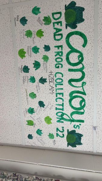A room tile in Mrs. Conroy's classroom that was made by her 2022 H2BE AM class. The tiles in her room are from each class and are normally an inside joke.