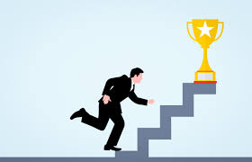  A man races to the top of the steps in hopes to reach the golden cup representing success.